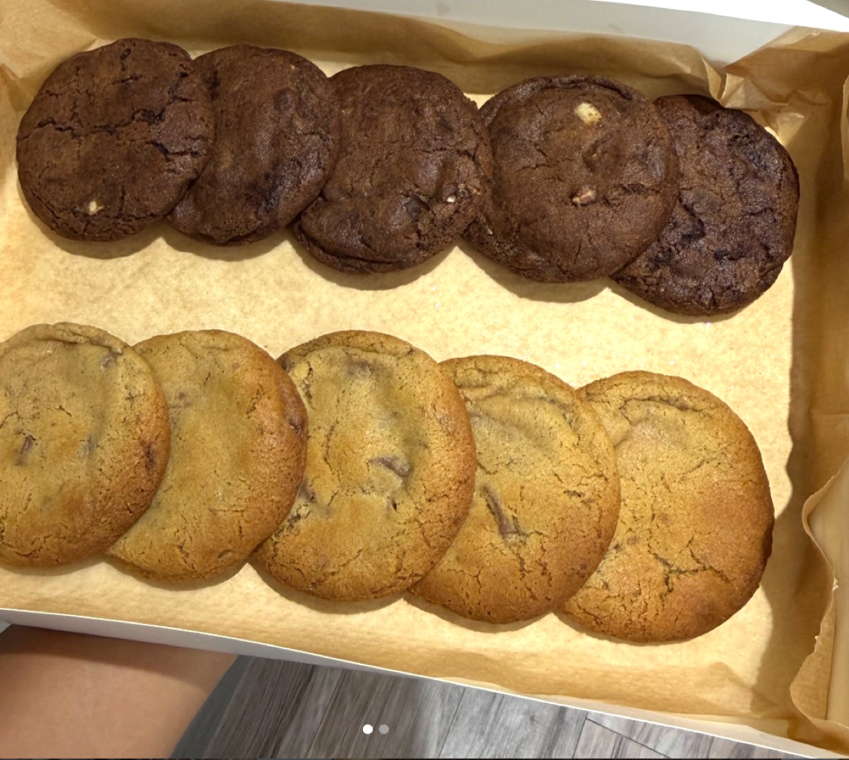 A box of classic milk and triple chocolate cookies